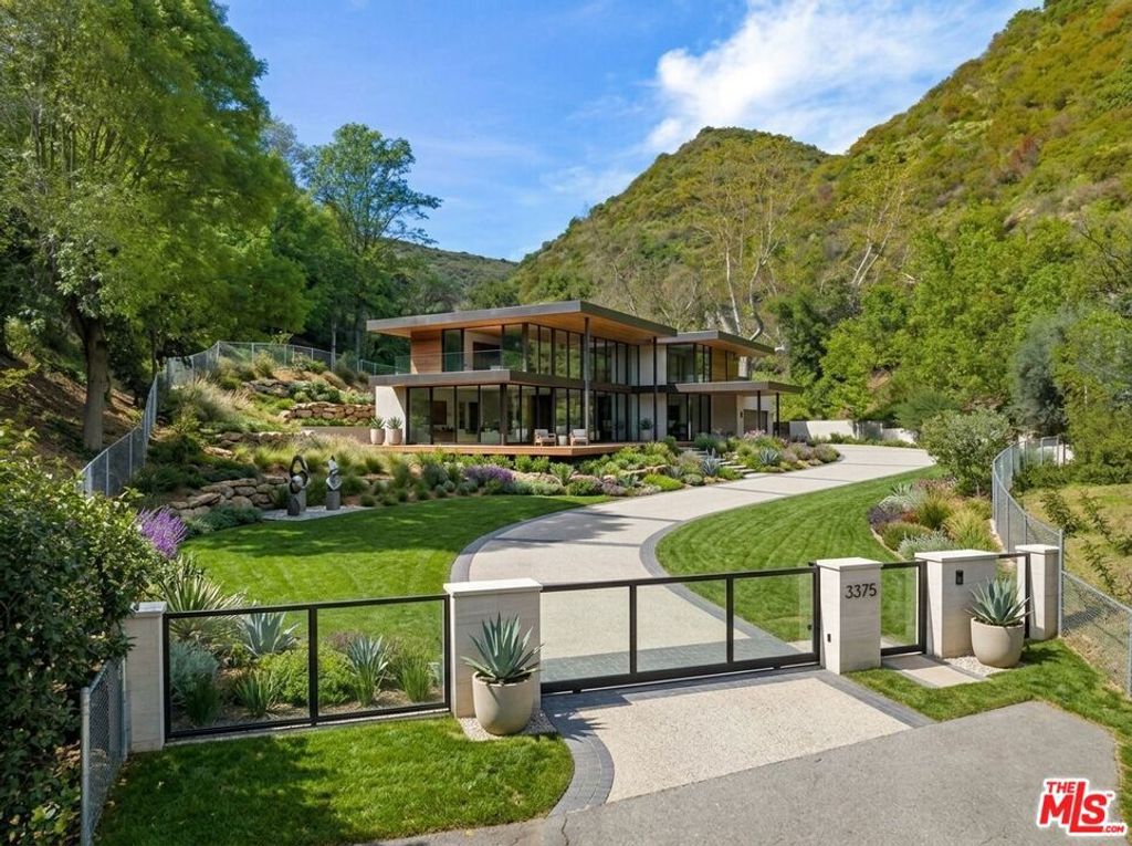 Image 1 of property listing at 3375 Mandeville Canyon Road, Los Angeles, CA 90049