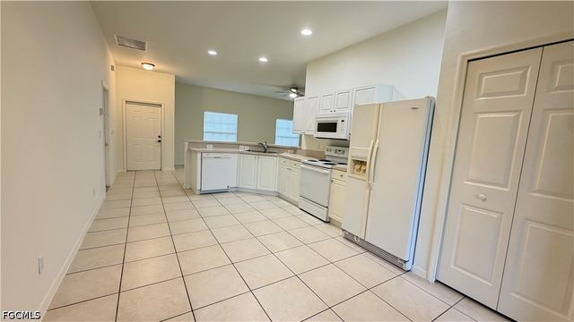 3202 10th ST SW, Lehigh Acres, FL 33976