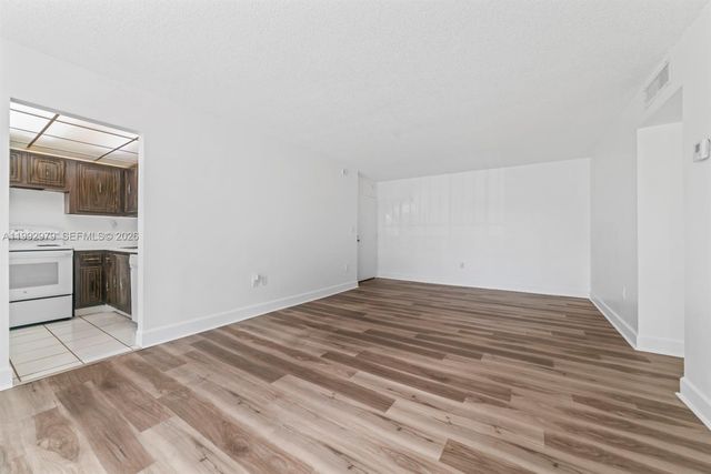 498 NW 165th St Rd D-201, Miami, FL 33169