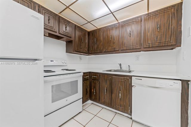 498 NW 165th St Rd D-201, Miami, FL 33169