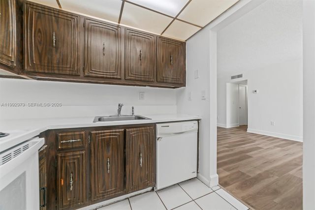 498 NW 165th St Rd D-201, Miami, FL 33169