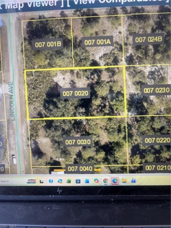 1620 Lincoln AVE, LEHIGH ACRES, FL 33972 — exterior