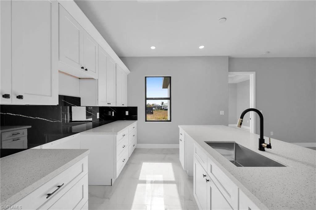 Image 15 of property listing at 1225 NE 5th PL, Cape Coral, FL 33909