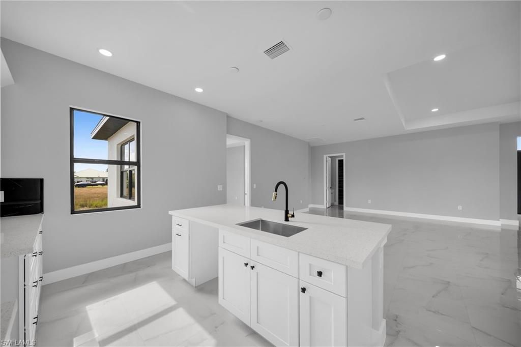 Image 16 of property listing at 1225 NE 5th PL, Cape Coral, FL 33909