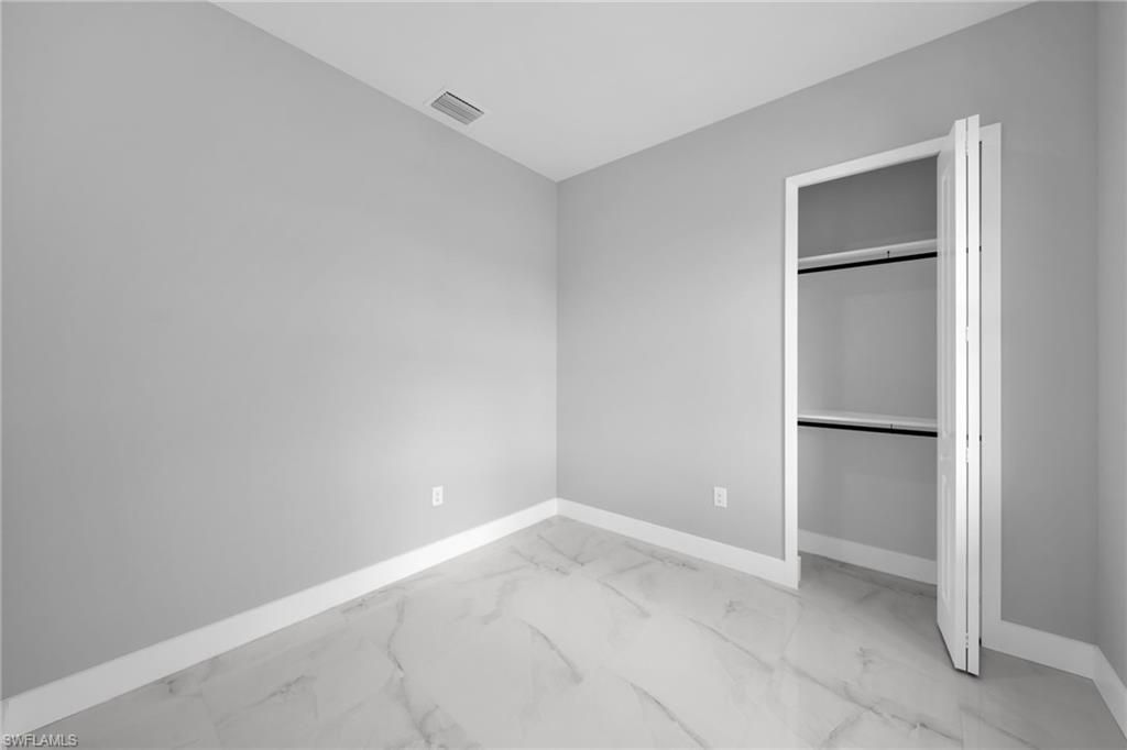 Image 7 of property listing at 1225 NE 5th PL, Cape Coral, FL 33909