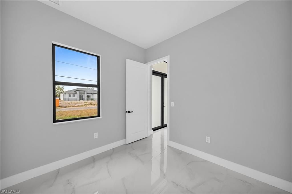 Image 8 of property listing at 1225 NE 5th PL, Cape Coral, FL 33909