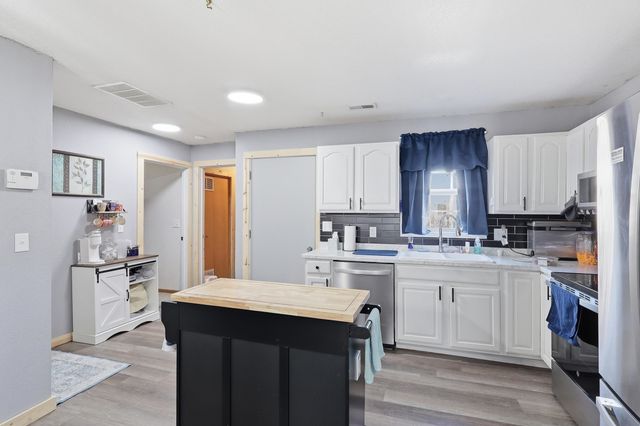 226 E 1st St, Douglass, KS 67039