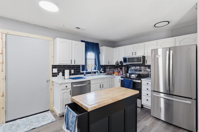 226 E 1st St, Douglass, KS 67039