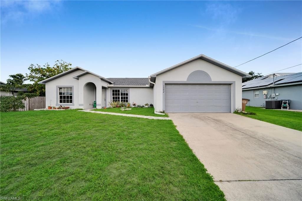 1502 SE 2nd PL, CAPE CORAL, FL 33990 — exterior