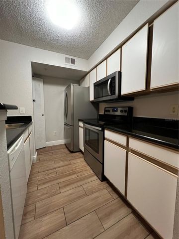 2216 GRAND CAYMAN COURT 1435, Kissimmee, FL 34741