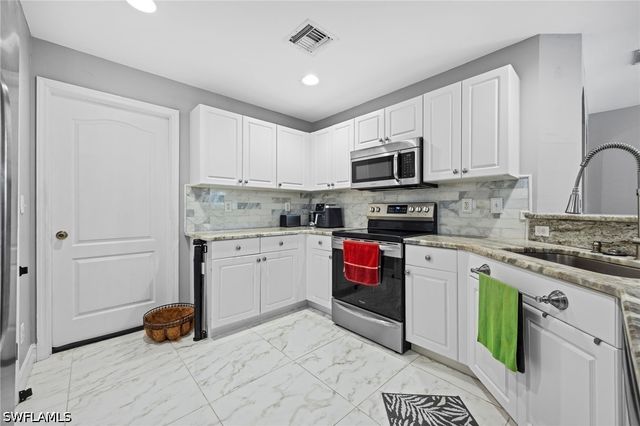 421 Broadmoor ST, Lehigh Acres, FL 33974