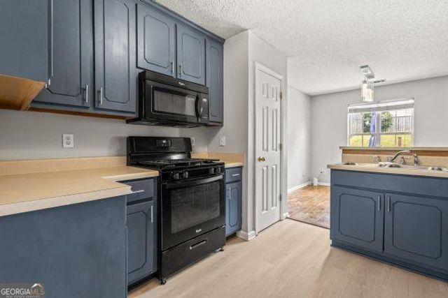 5873 Colonnade Drive, Rex, GA 30273