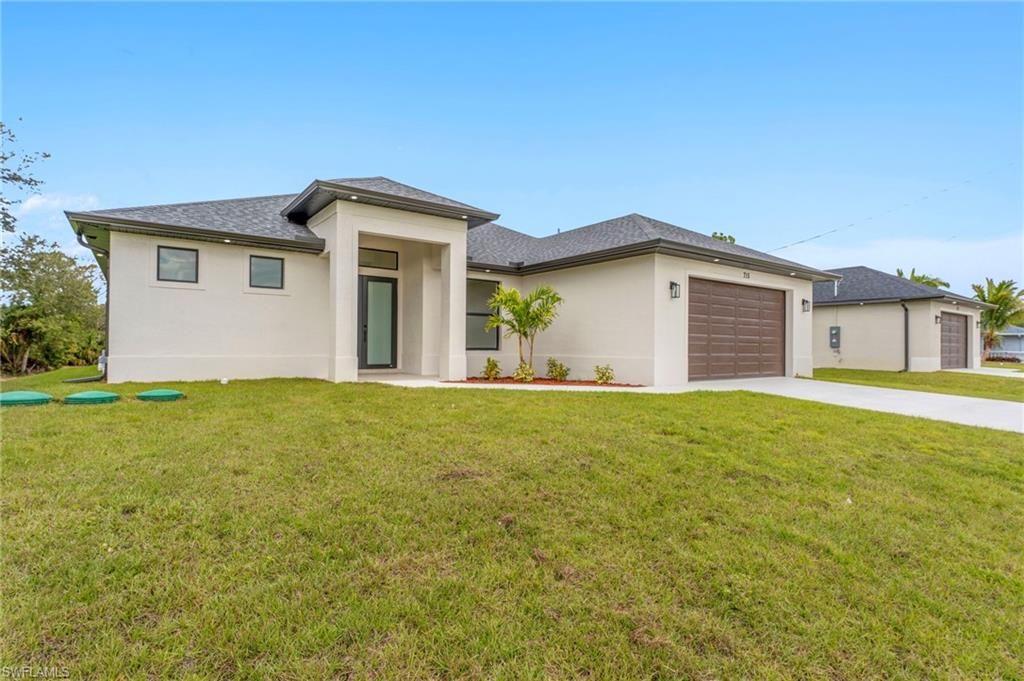 715 Theodore Vail ST E, LEHIGH ACRES, FL 33974 — photo 2