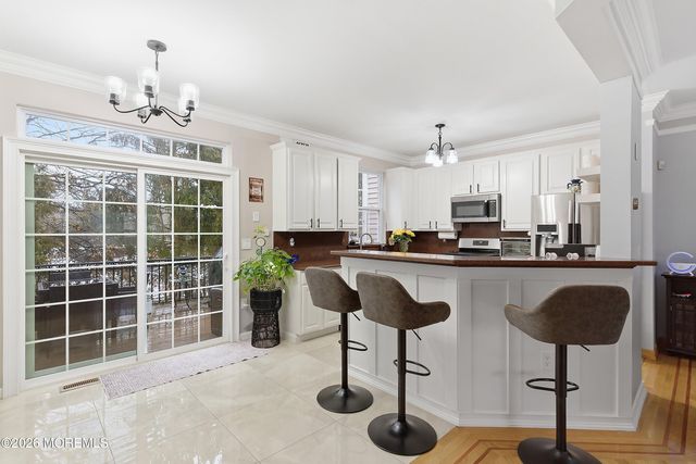 206 Hidden Lake Drive, Morganville, NJ 07751