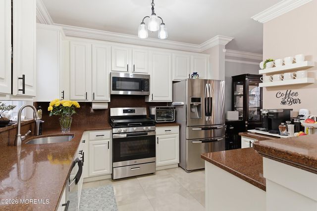 206 Hidden Lake Drive, Morganville, NJ 07751