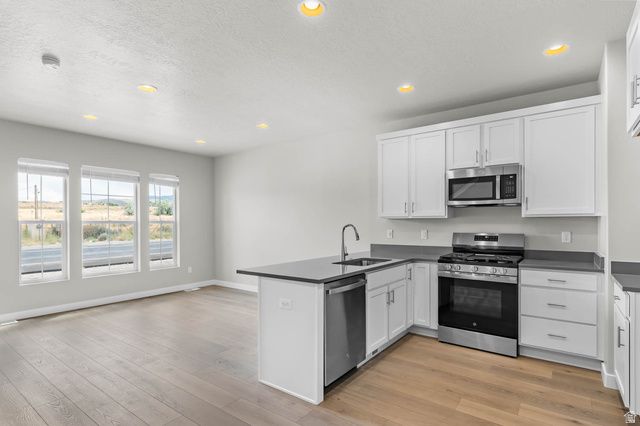 8213 W MADISON PEAK WAY, Magna, UT 84044