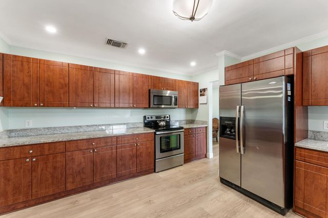 7410 Venetian Way, Lake Clarke Shores, FL 33406