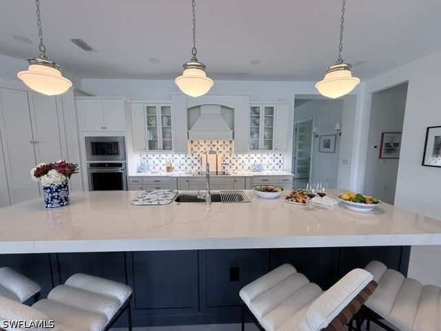 8963 Gustavia CT, Naples, FL 34112