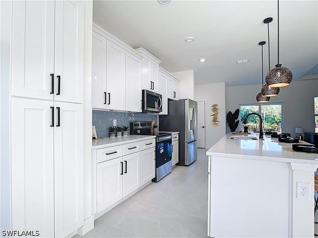 422 Eisenhower BLVD, Lehigh Acres, FL 33974
