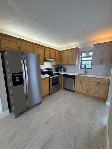 9273 SW 8th St 311, Boca Raton, FL 33428