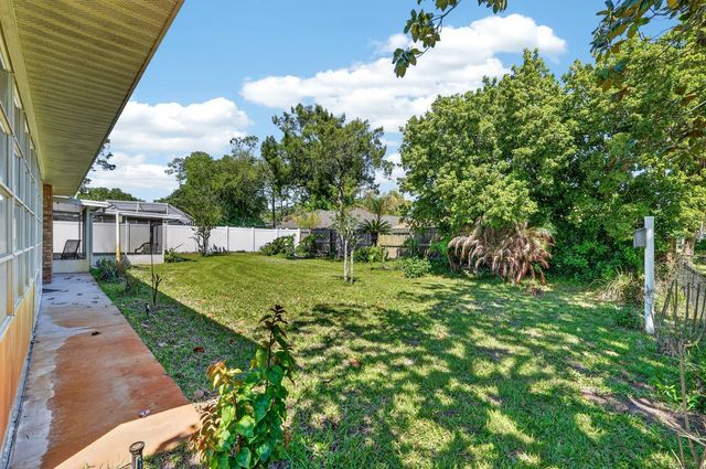 153 WELLSTONE DRIVE, Palm Coast, FL 32164