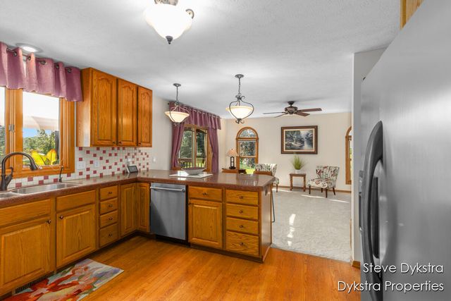 2264 Grand Valley Drive, Ada, MI 49301