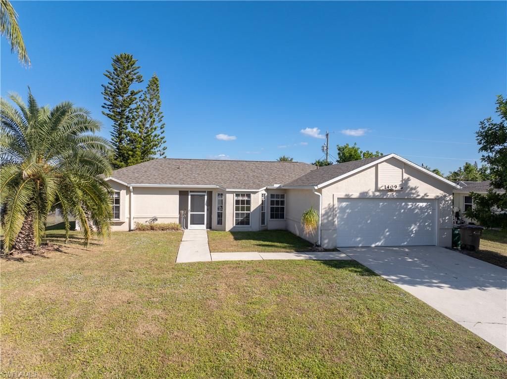 Image 1 of property listing at 1409 SW 11th PL, Cape Coral, FL 33991