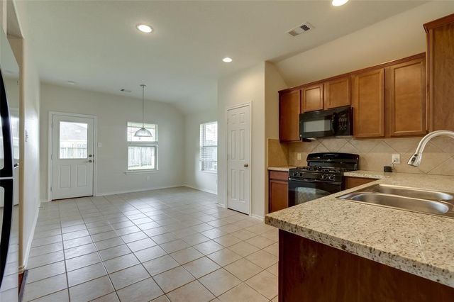 8731 Sunny Gallop Drive, Tomball, TX 77375