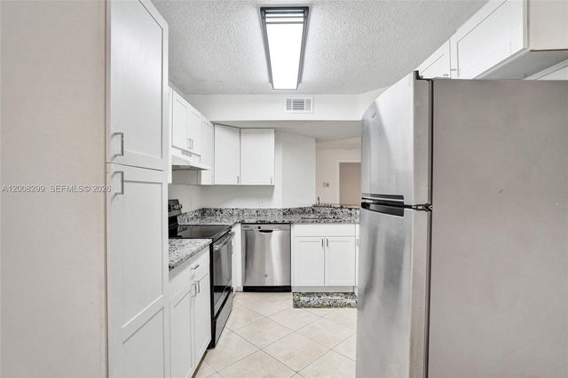 8721 Wiles Rd 101, Coral Springs, FL 33067