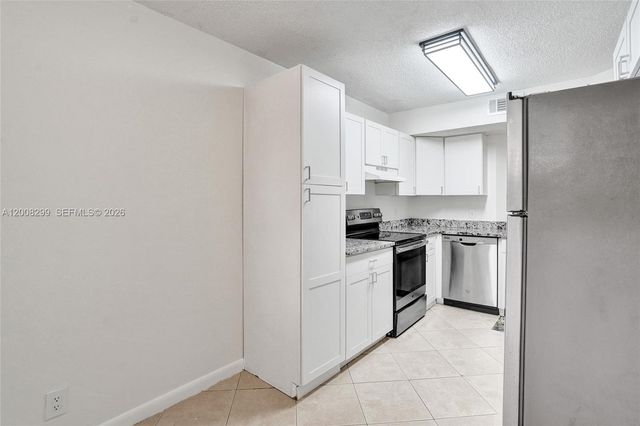 8721 Wiles Rd 101, Coral Springs, FL 33067