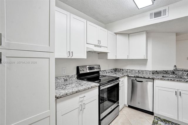 8721 Wiles Rd 101, Coral Springs, FL 33067