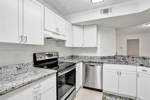 8721 Wiles Rd 101, Coral Springs, FL 33067