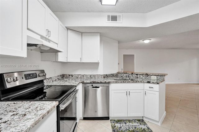 8721 Wiles Rd 101, Coral Springs, FL 33067