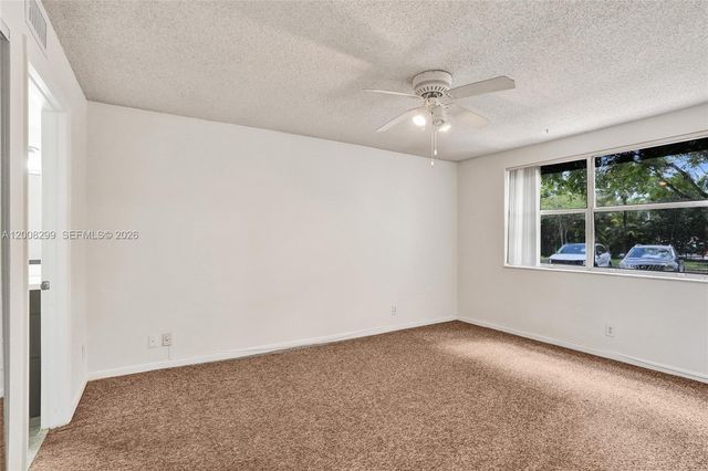 8721 Wiles Rd 101, Coral Springs, FL 33067