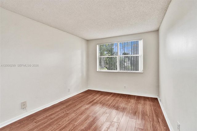 8721 Wiles Rd 101, Coral Springs, FL 33067