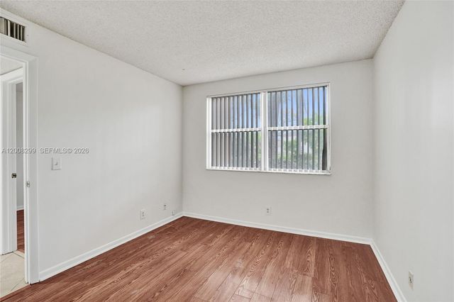 8721 Wiles Rd 101, Coral Springs, FL 33067