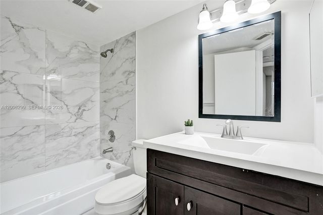 8721 Wiles Rd 101, Coral Springs, FL 33067