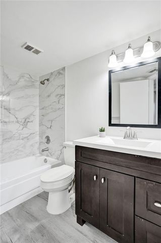 8721 Wiles Rd 101, Coral Springs, FL 33067