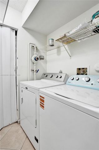 8721 Wiles Rd 101, Coral Springs, FL 33067