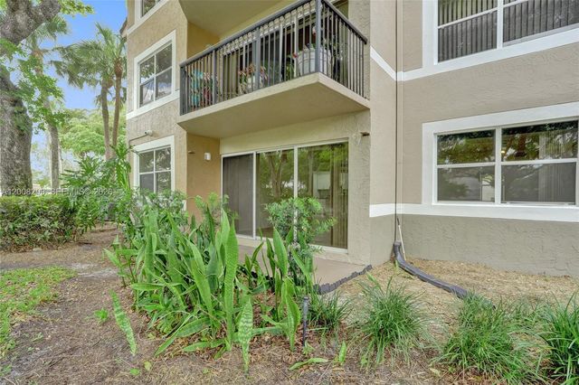 8721 Wiles Rd 101, Coral Springs, FL 33067