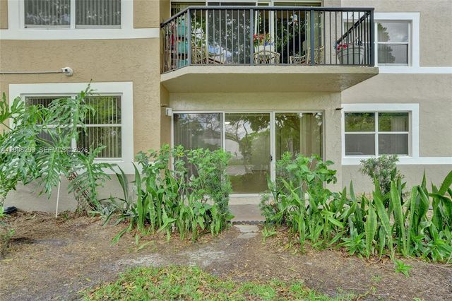 8721 Wiles Rd 101, Coral Springs, FL 33067