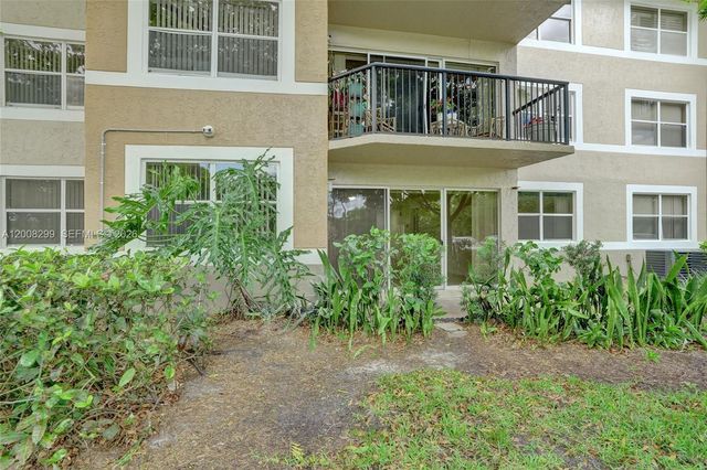 8721 Wiles Rd 101, Coral Springs, FL 33067
