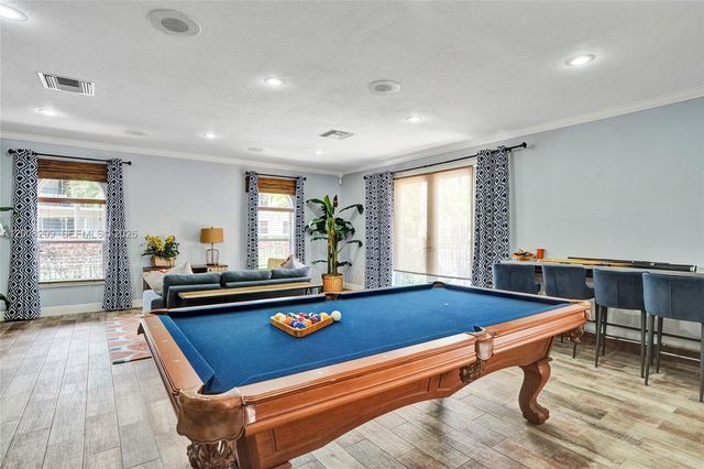 8721 Wiles Rd 101, Coral Springs, FL 33067