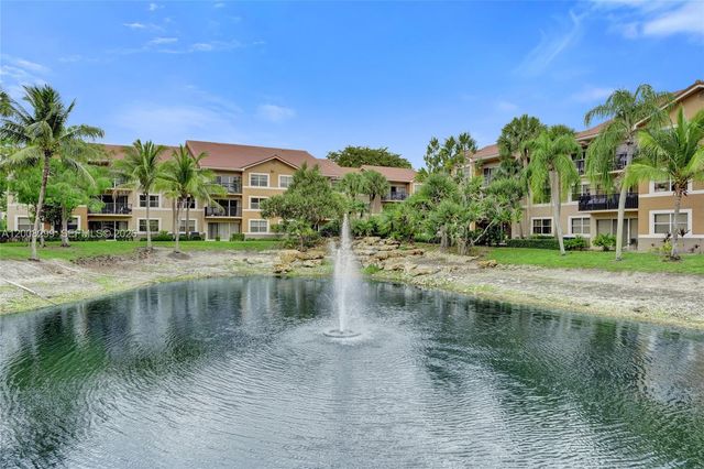 8721 Wiles Rd 101, Coral Springs, FL 33067