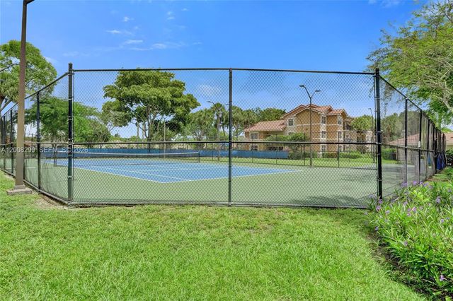 8721 Wiles Rd 101, Coral Springs, FL 33067