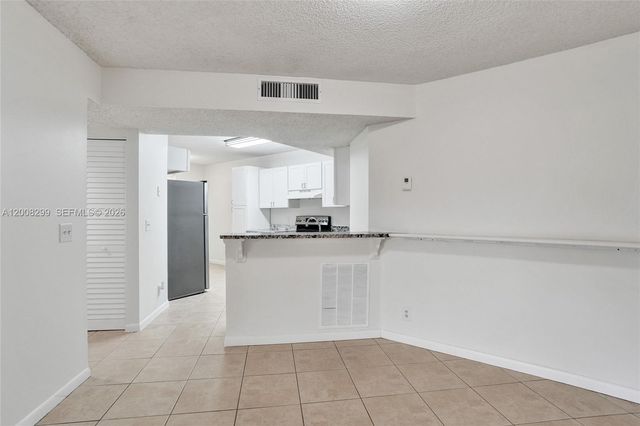 8721 Wiles Rd 101, Coral Springs, FL 33067