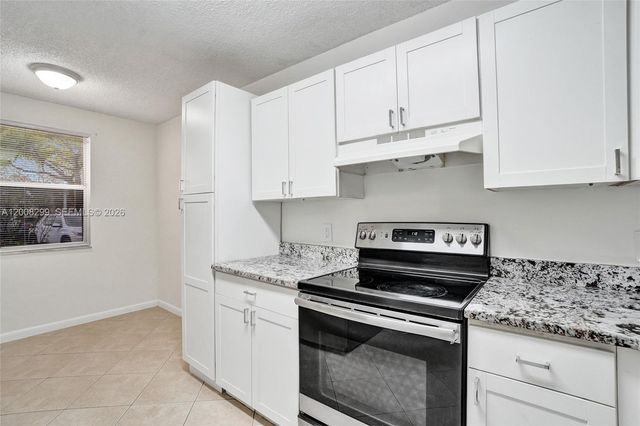 8721 Wiles Rd 101, Coral Springs, FL 33067