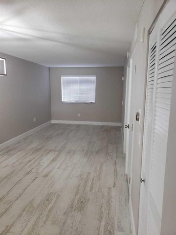 3512 Briar Bay Boulevard 105, West Palm Beach, FL 33411