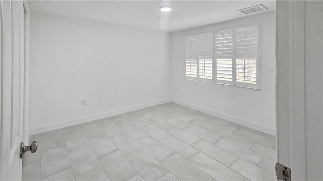 3633 ROCK ROYAL DRIVE 1, Holiday, FL 34691
