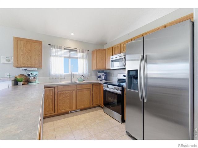 1303 S Harvester Drive, Milliken, CO 80543